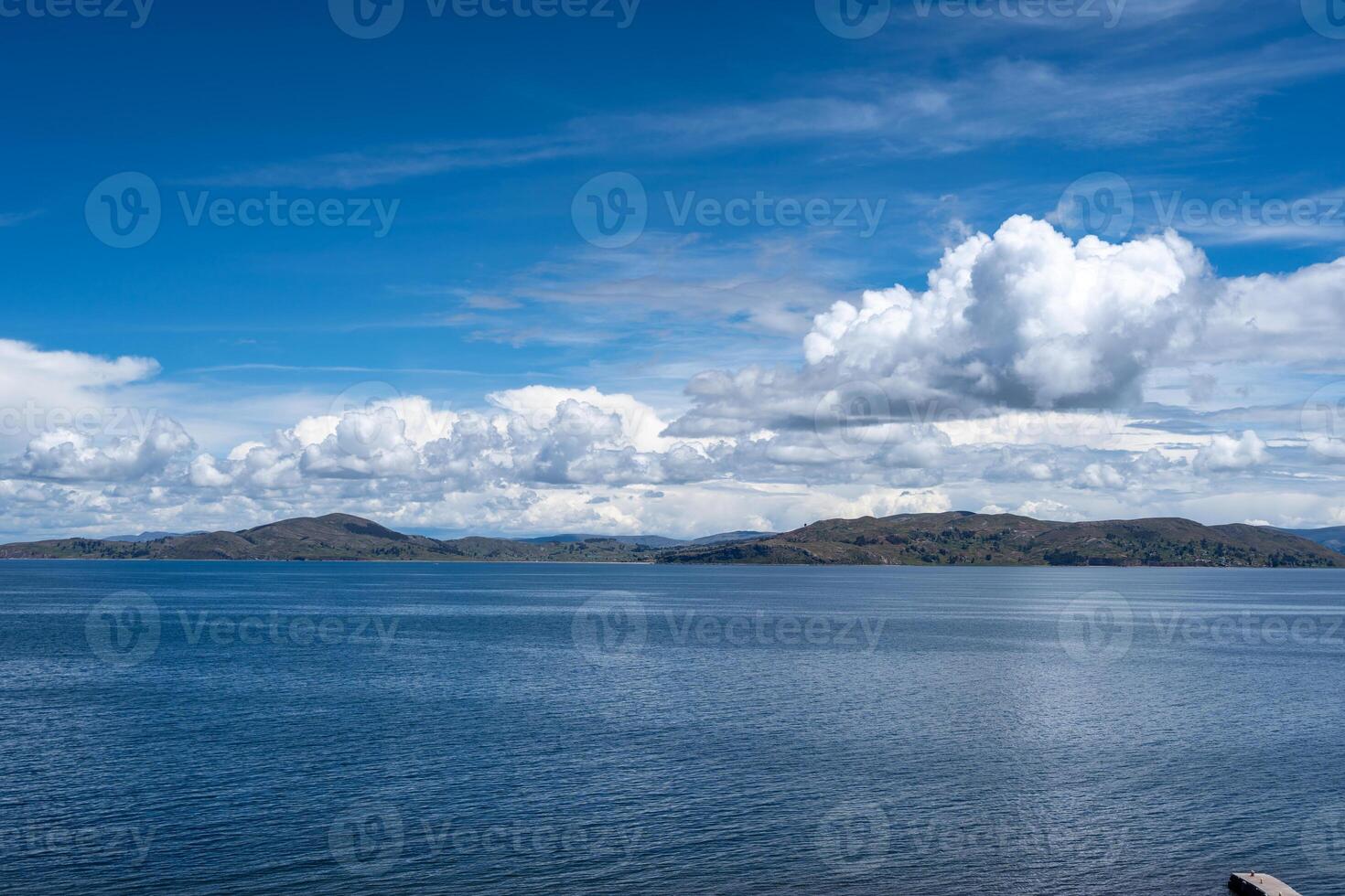 A View of Lake Titicaca from Llachon with distant islands and hills photo