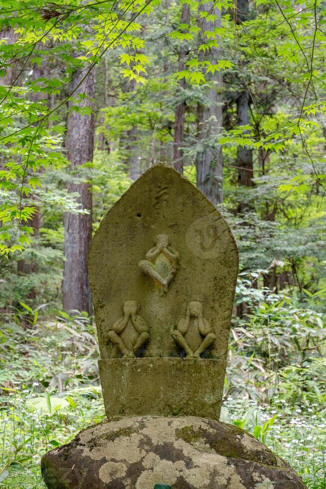 Carved stone on Higashiyama Walking Course in Takayama, Japan photo