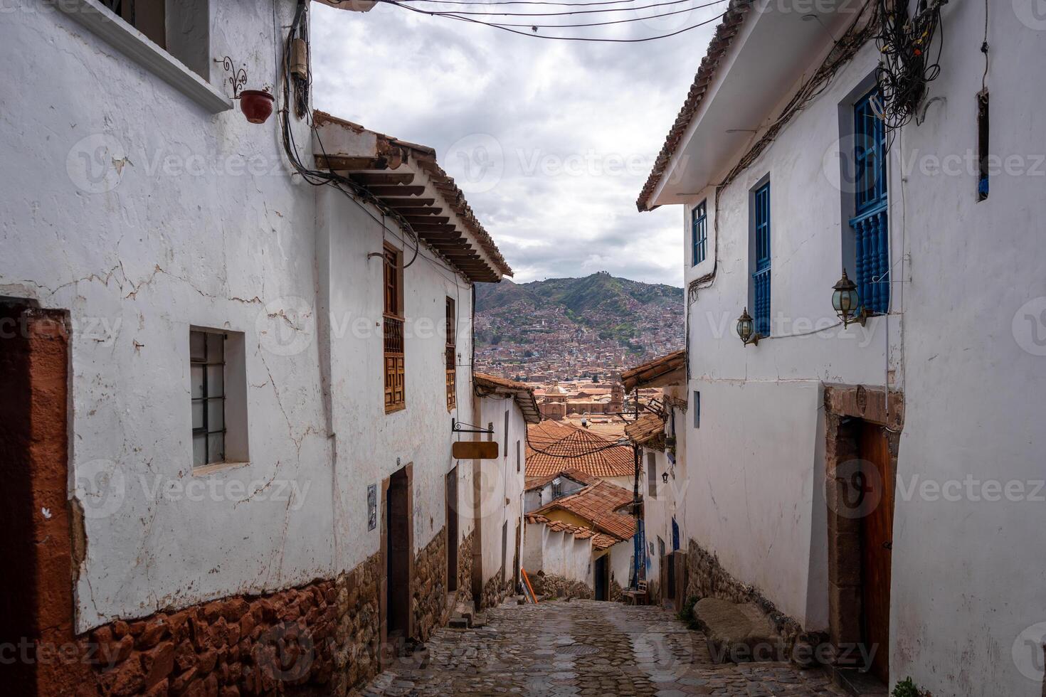 A Charming Street in San Blas Neighborhood, Cusco, with Whitewashed Walls photo