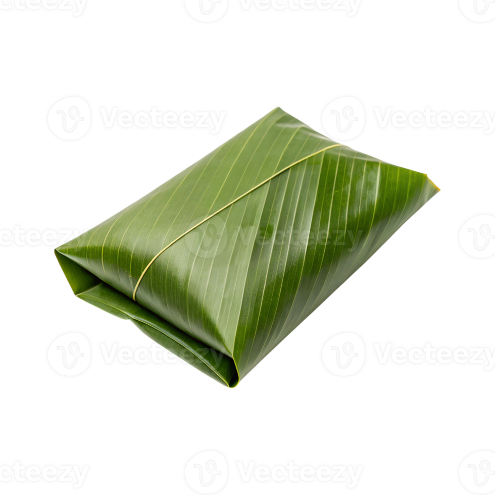 A single parcel of food wrapped in a fresh green banana leaf isolated png