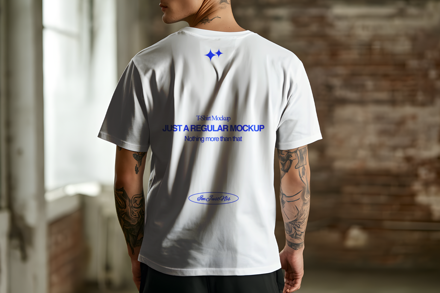 Back View of a T-Shirt Mockup on a Tattooed Model psd
