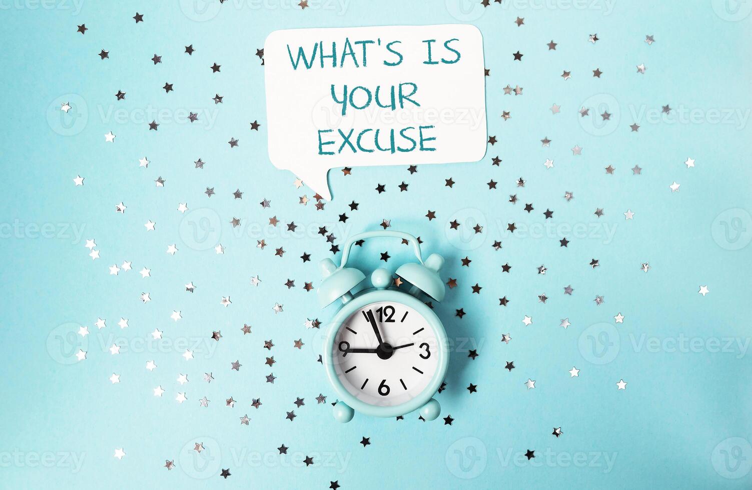 Clock with the words Whats your excuse written above it symbolizing time management and motivation photo