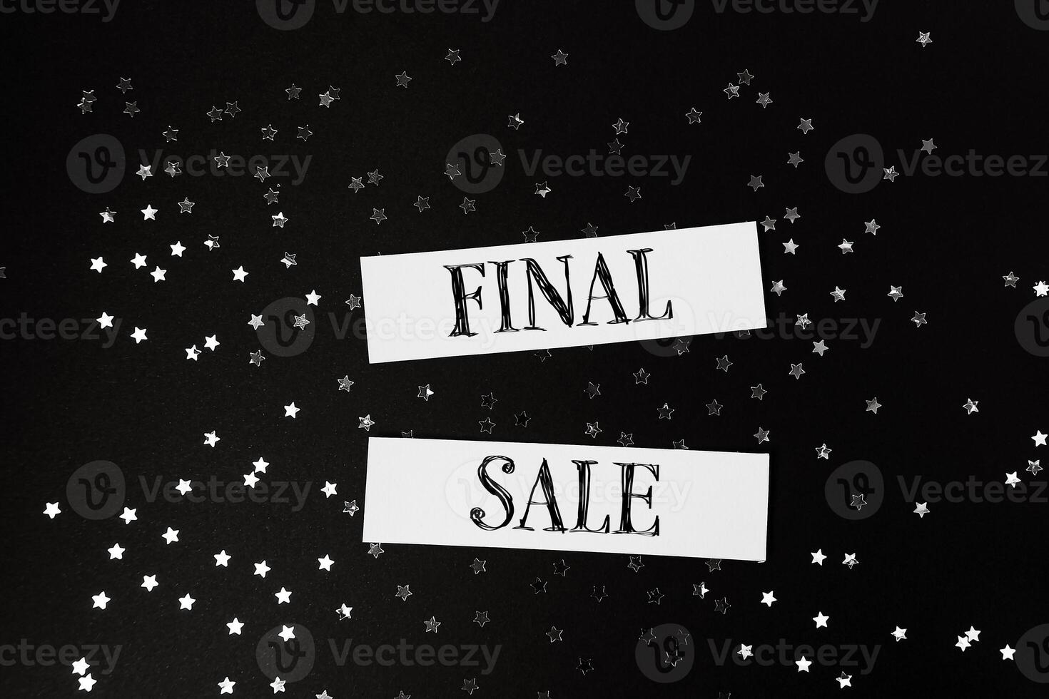 Black and white image of stars with the words Final Sale written in white photo