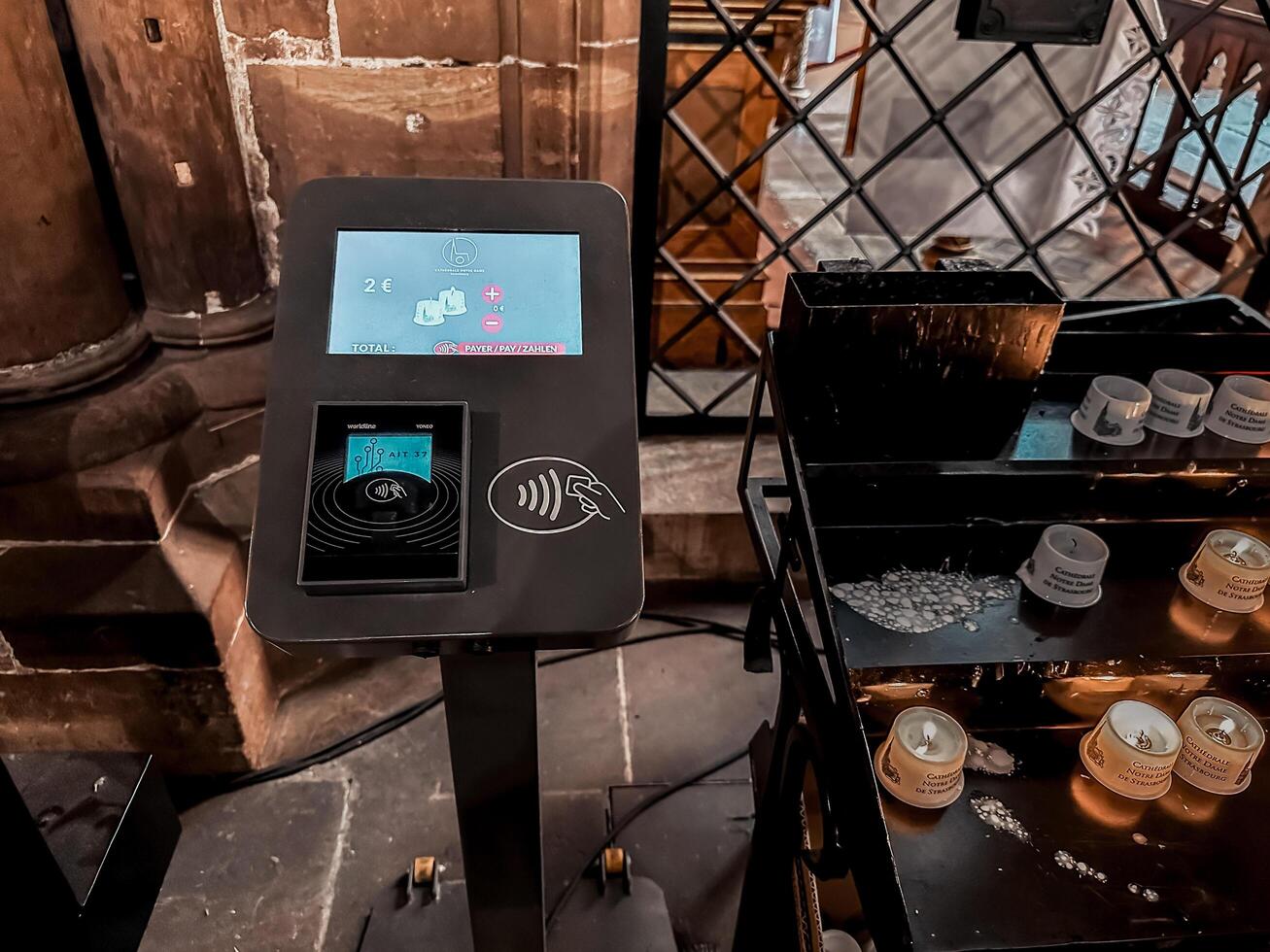 Strasbourg, France - July 26, 2024 - Black electronic device with a screen that says Card Reader on it photo