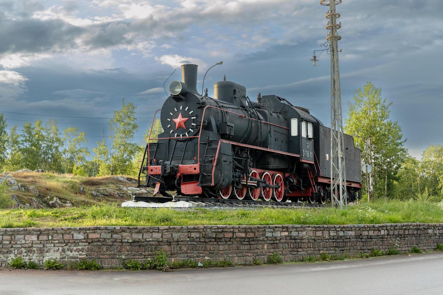 Sortavala, Karelia, Russia - 8 July, 2023. Russian and Soviet steam locomotive Er-788-81 a monument at the railway station of Sortavala photo