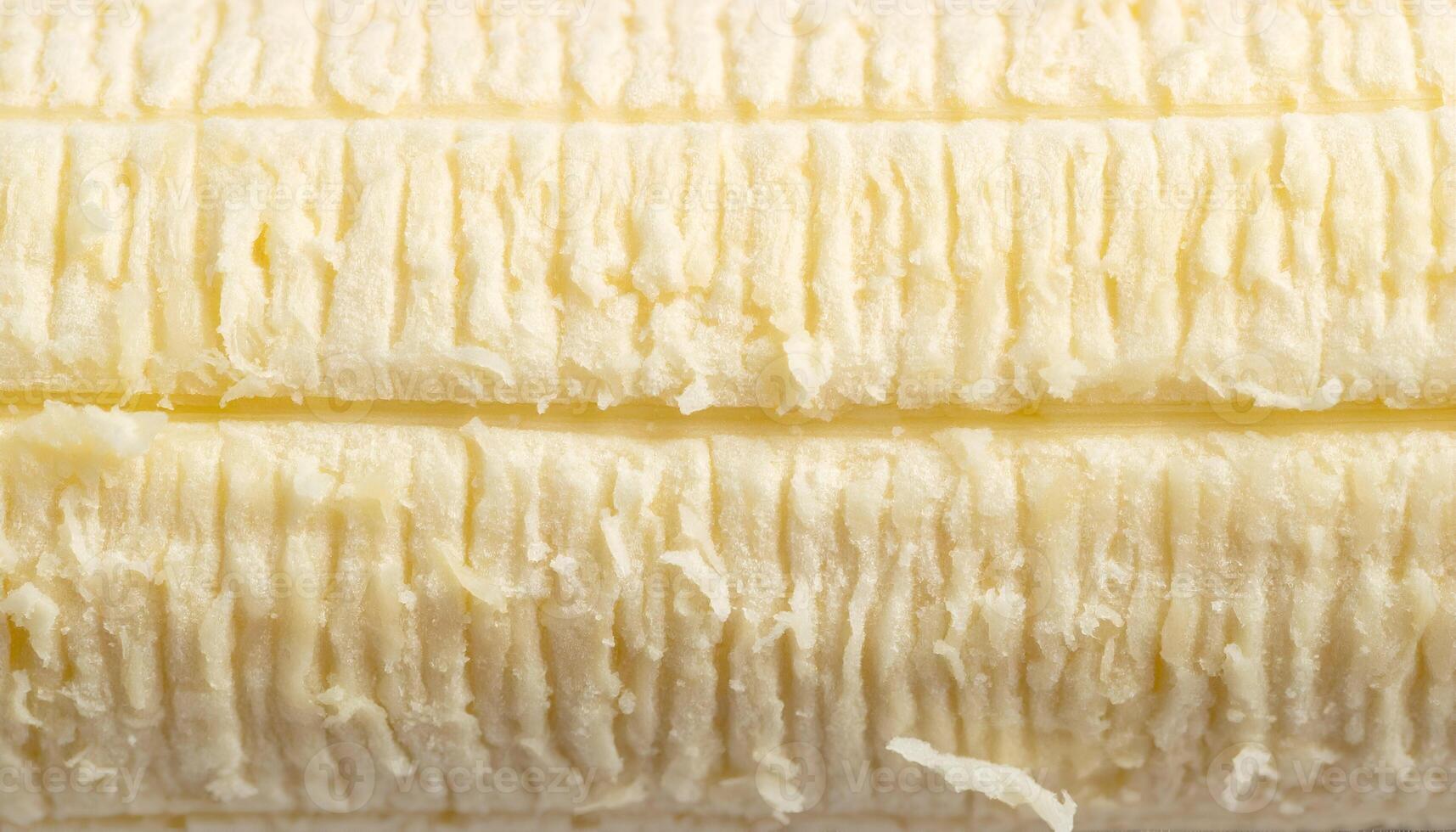 macro close-up texture of peeled banana surface with fibrous soft fruit pattern and natural light details for food background or organic texture photo