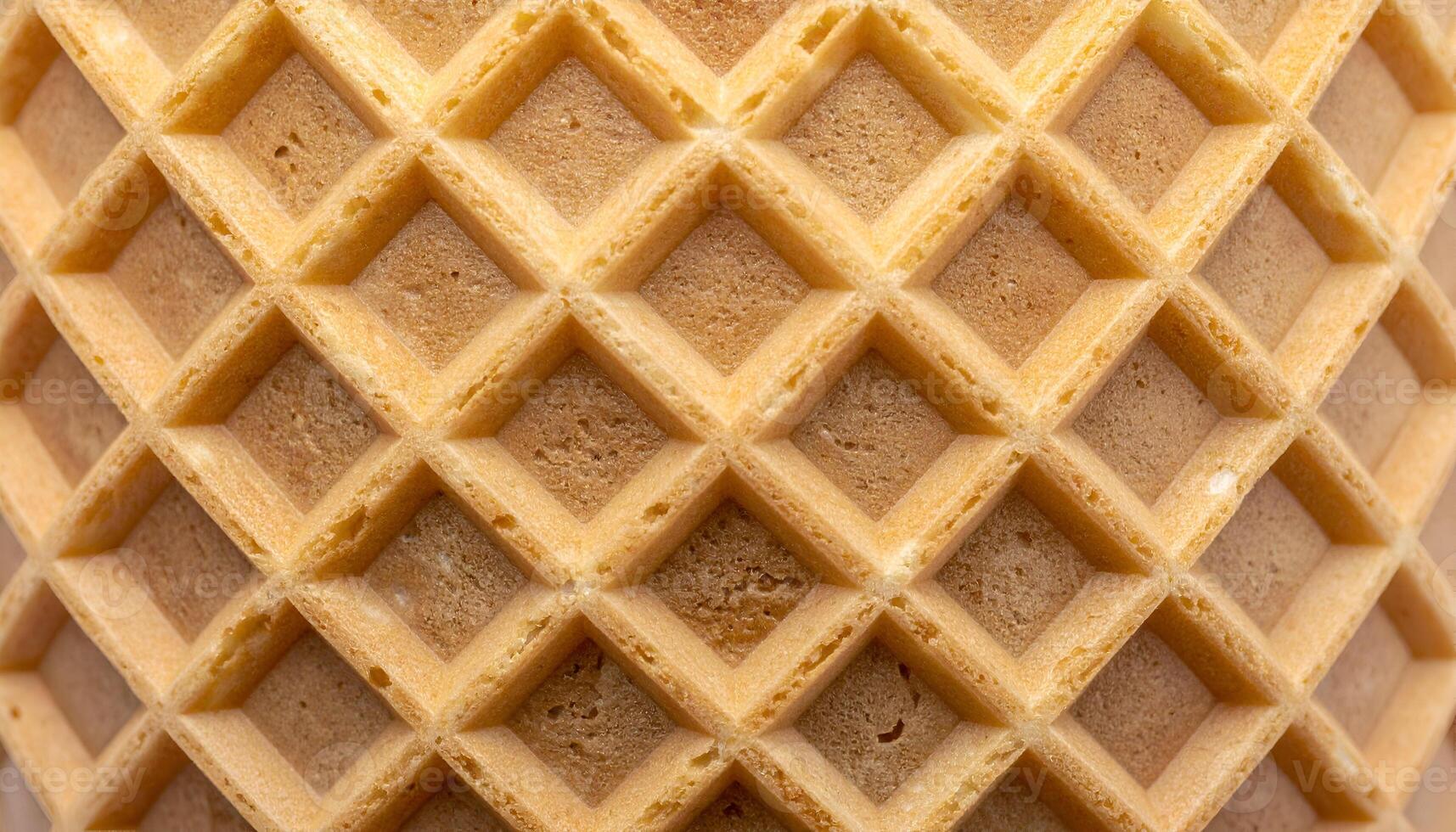 symmetrical waffle cone grid texture macro, crisp square pattern of baked dessert surface for food background or packaging design photo