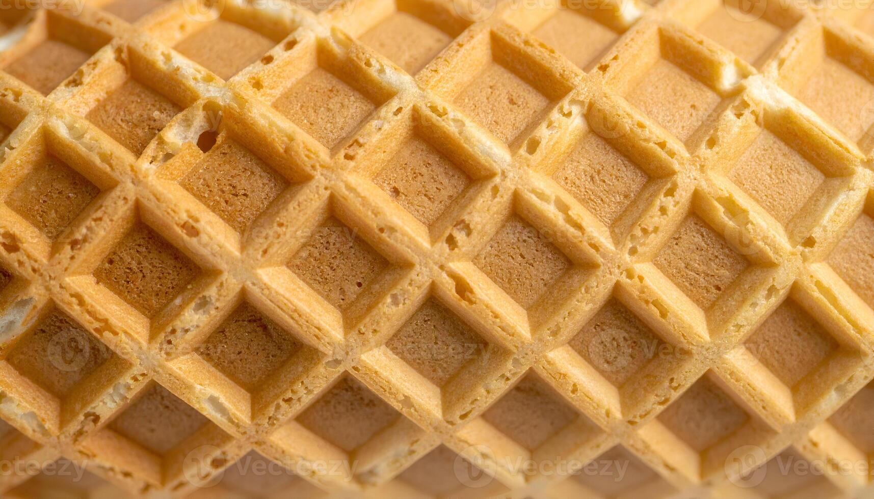 close-up waffle cone texture with crisp golden grid pattern, macro view of dessert surface for food design and bakery background photo
