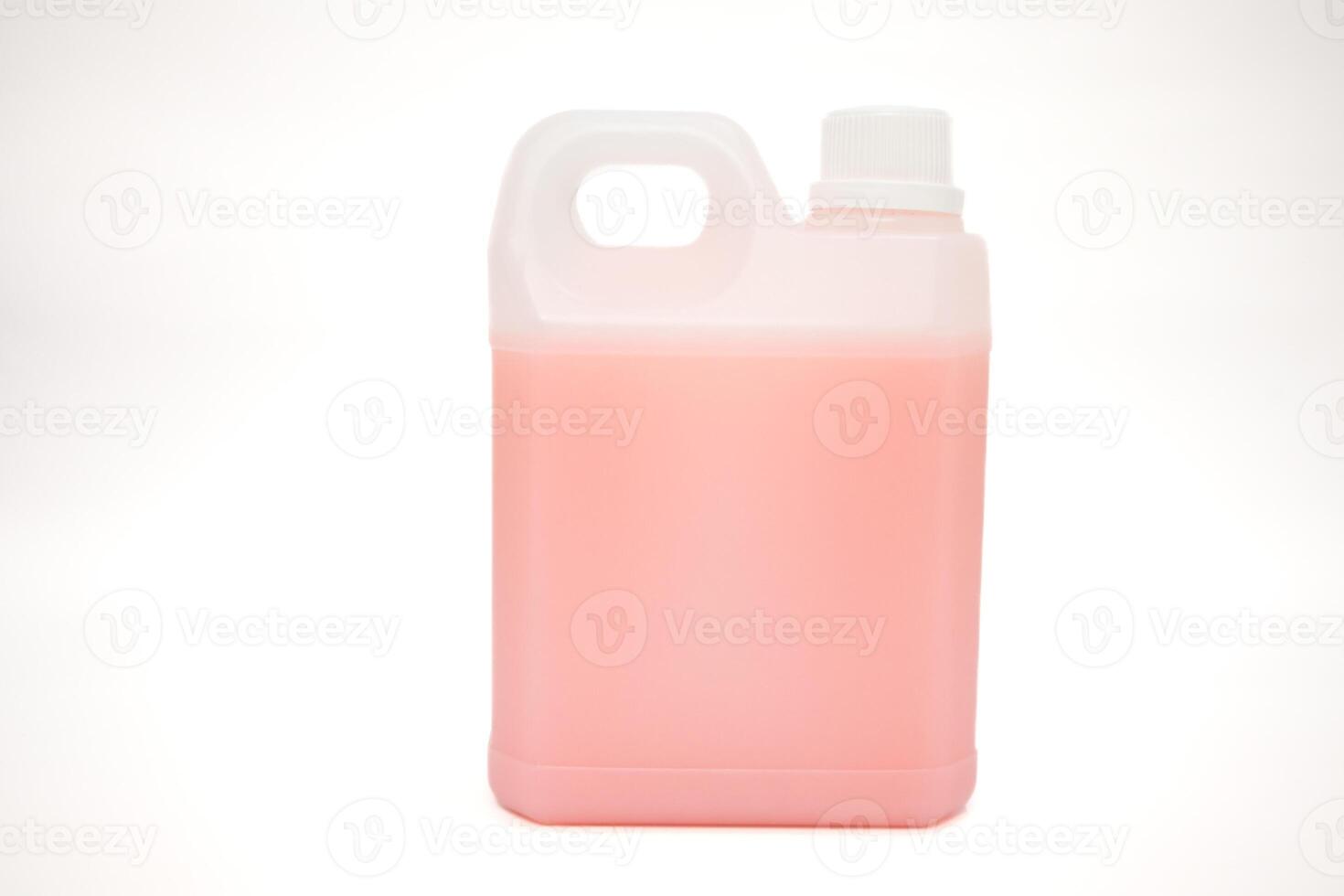 Pink Liquid in Plastic Container on White Background Ready for Usage at Home or Business photo