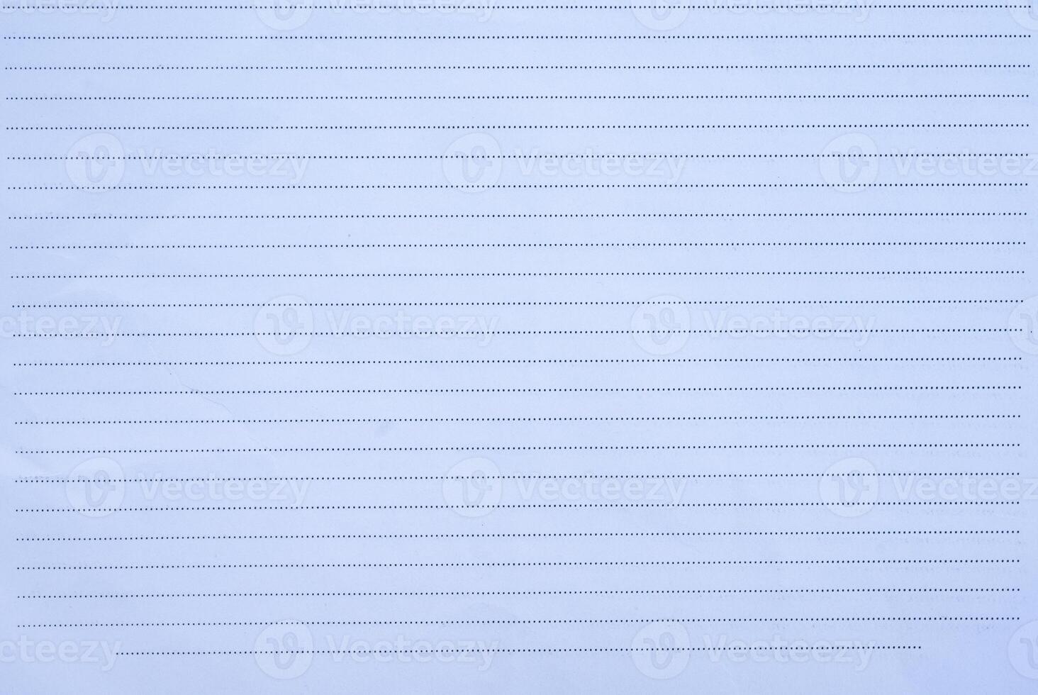 Full frame shot of blank notebook page. A book or stack of paper pages that are often ruled and used for purposes such as note-taking. photo