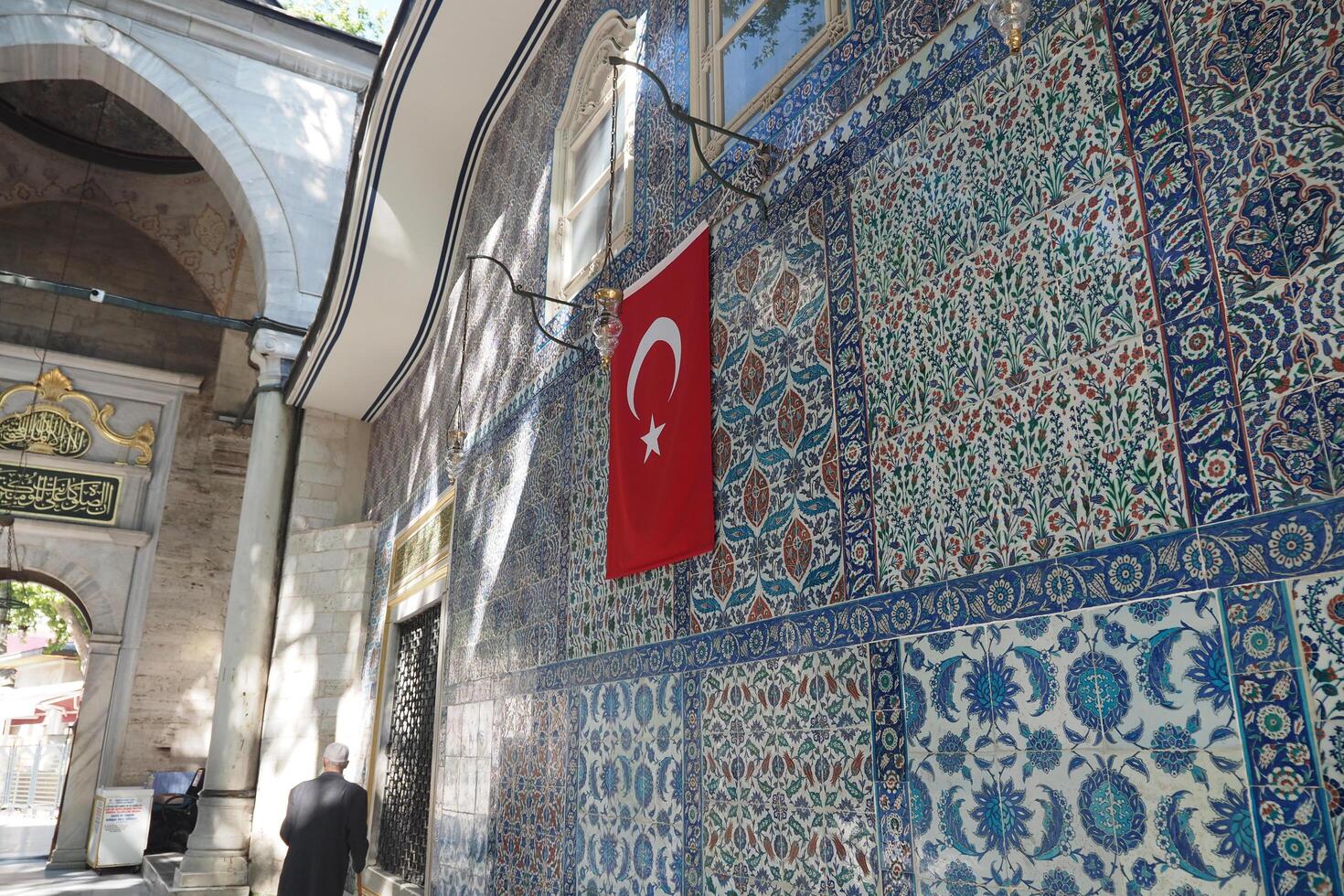 turkey istanbul 10 may 2025, Turkish flag displayed on historic tiled wall in Istanbul photo