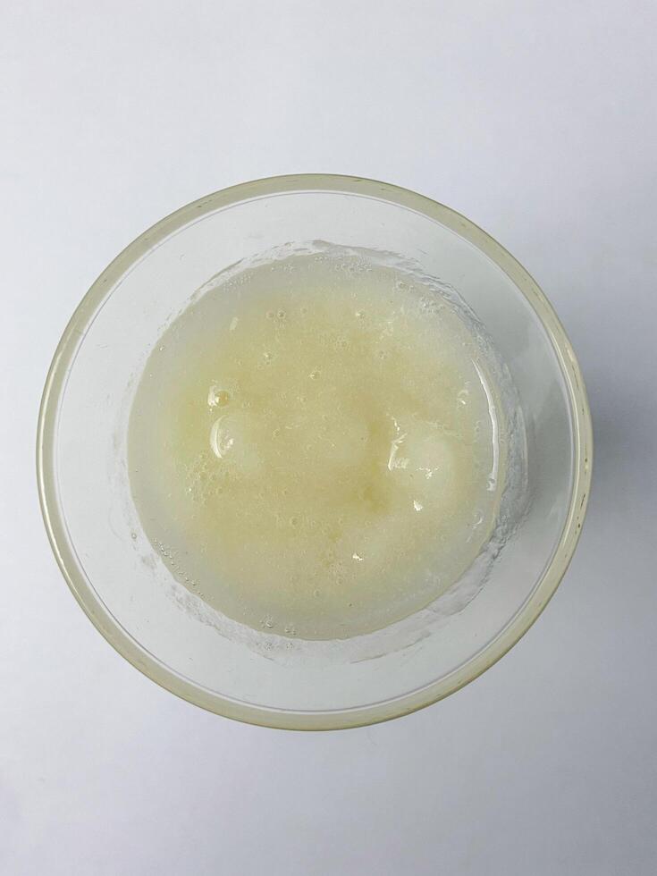 Refreshing aloe vera juice in a clear glass bowl for healthy living photo