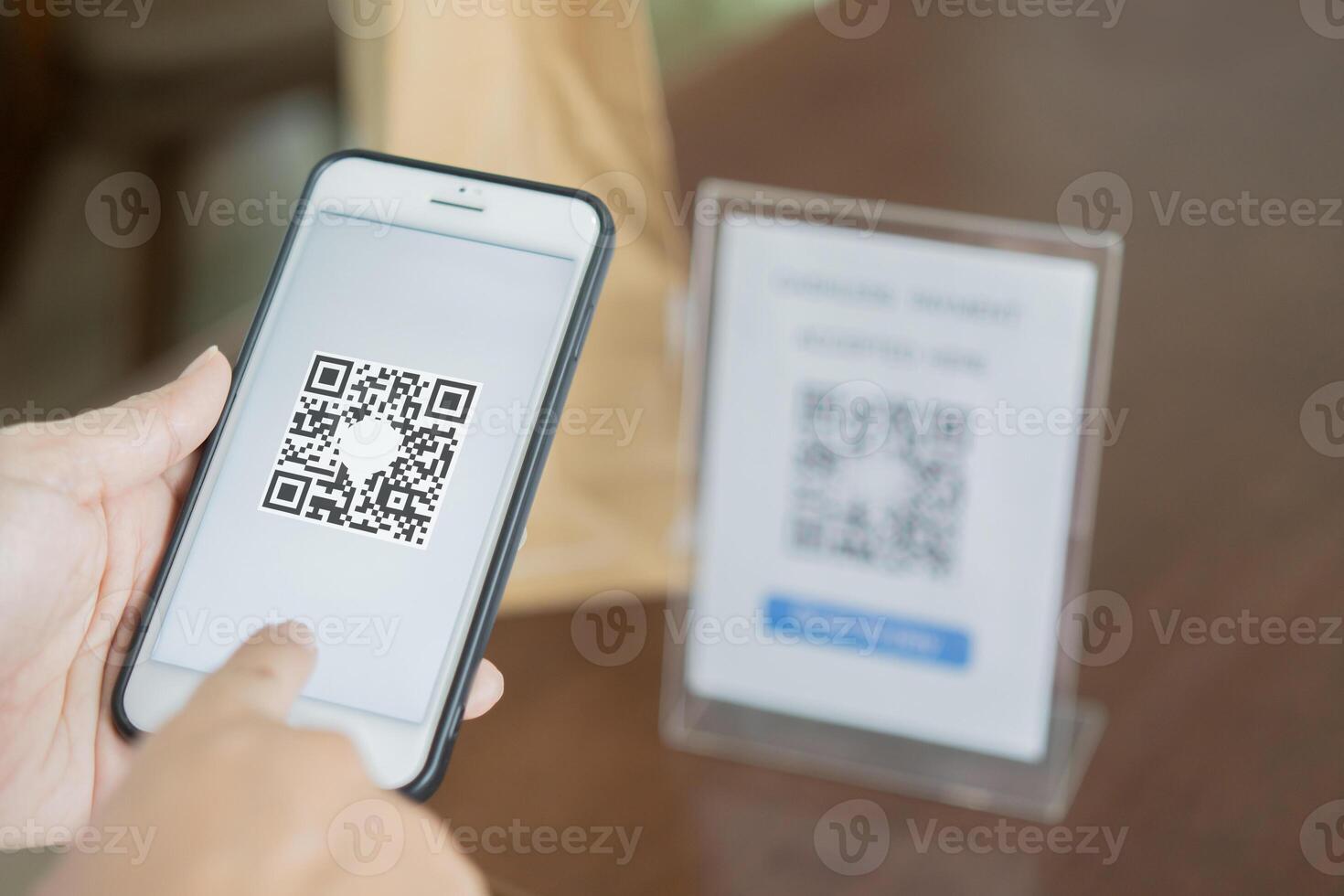 QR code payment, woman hands or customer using smartphone for paying at shop. photo