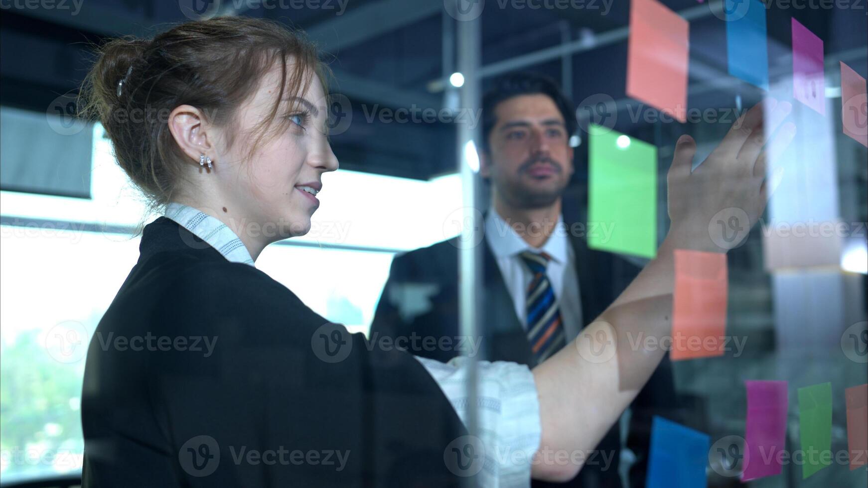 In the office, two businessmen and women discuss and exchange idea and give advice to each other to complete the work,95 photo