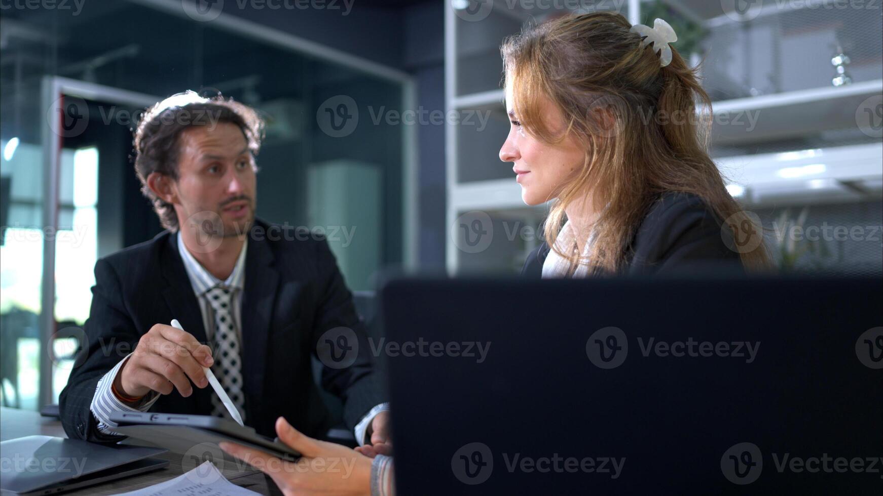 In the office, two businessmen and women discuss and exchange idea and give advice to each other to complete the work,82 photo