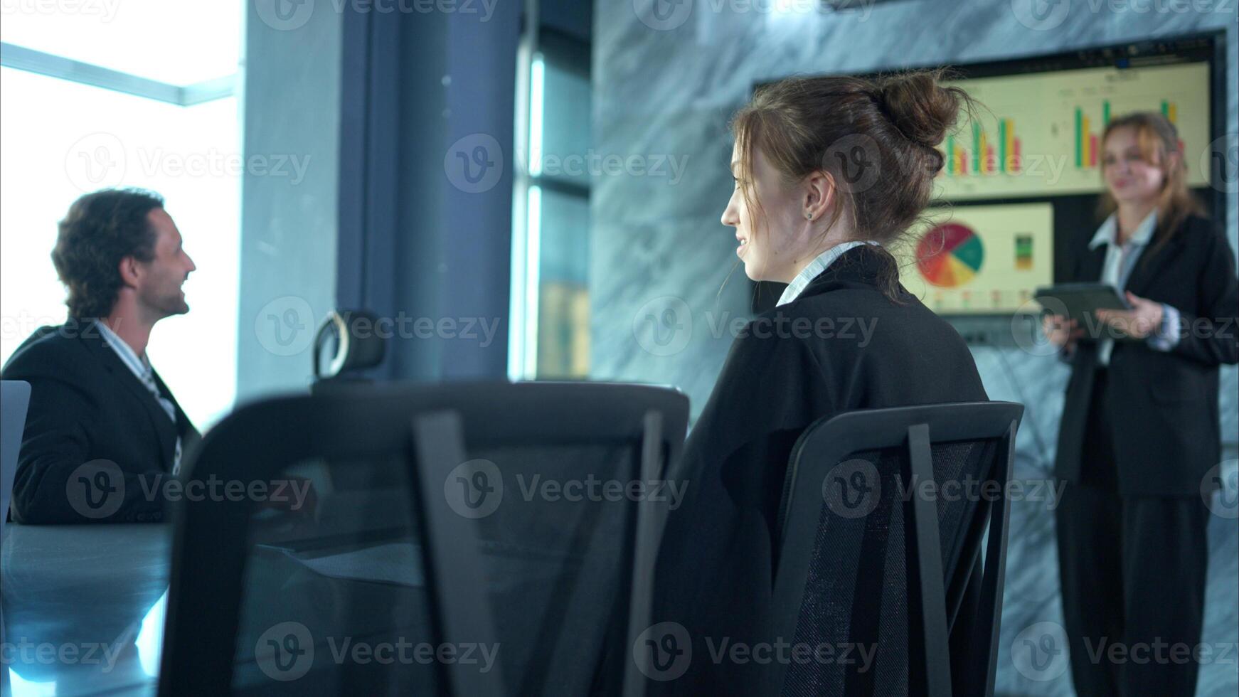 In the conference room, a group of businesspeople are discussing the follow-up meeting and the results of operations,61 photo