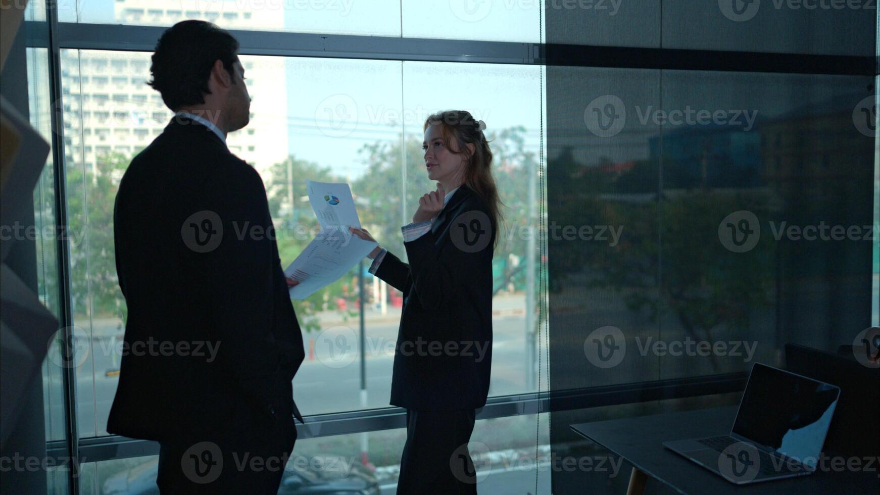 In the office, two businessmen and women discuss and exchange idea and give advice to each other to complete the work,20 photo
