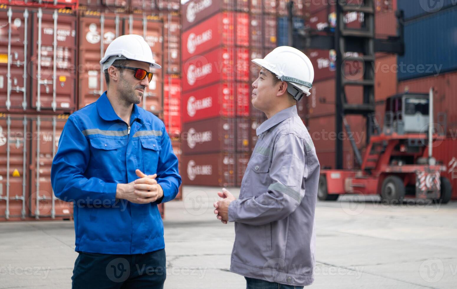 Engineers and technicians supervise and inspect the delivery of containers at container manufacturing and storage site,100 photo