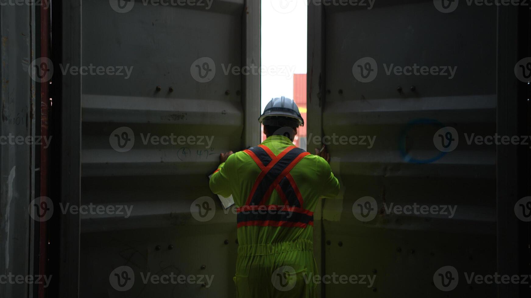 Engineers and technicians inspect the inside of containers,83 photo