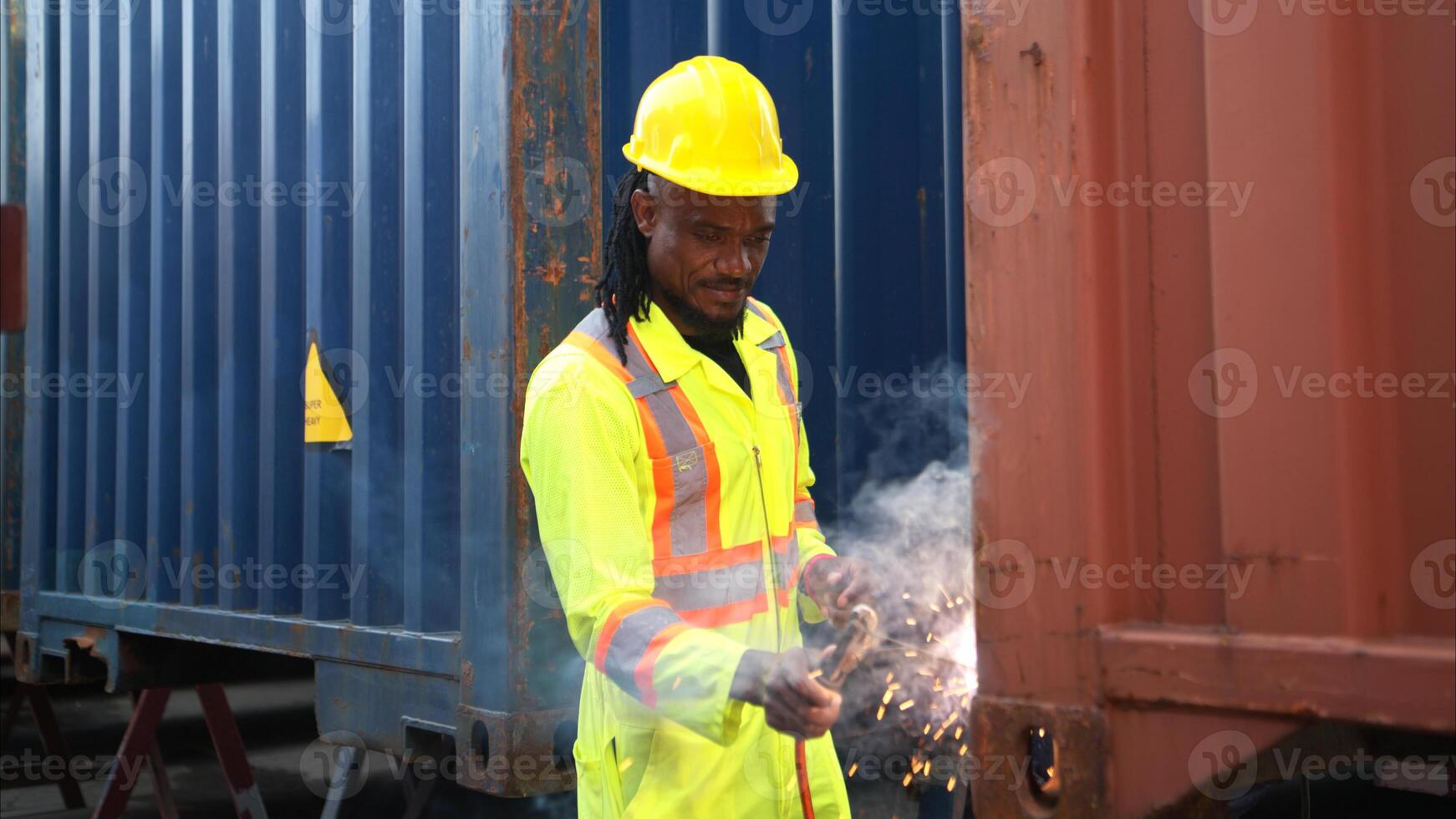 Technicians inspect container repairs by welding at container,2 photo