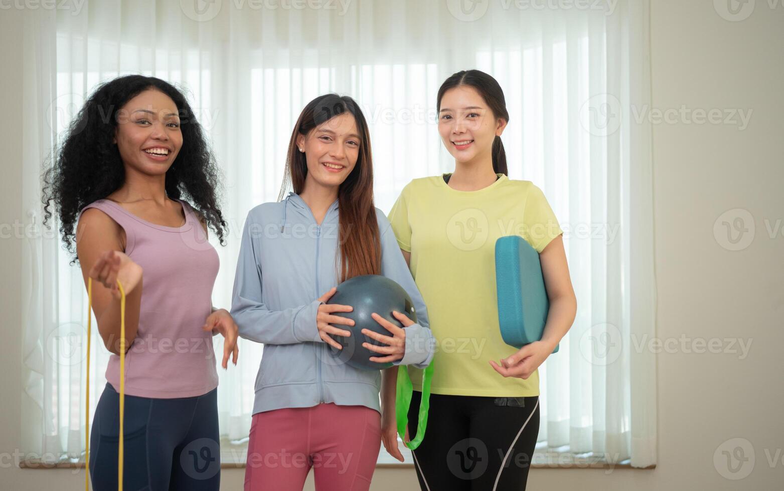 A group of young sport woman breaks after yoga class,9 photo