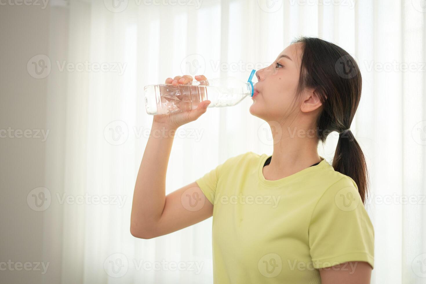 Portrait of young sports women breaks and drinks water after yoga practice,3 photo