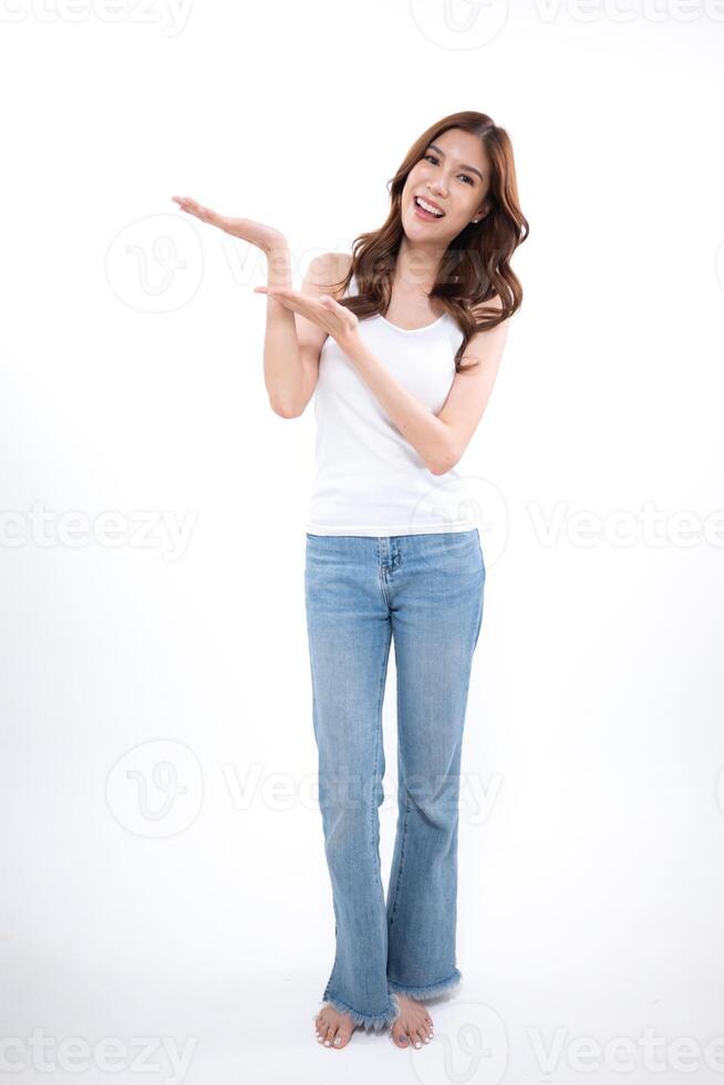 A portrait of a young Asian woman posing in a studio,4 photo