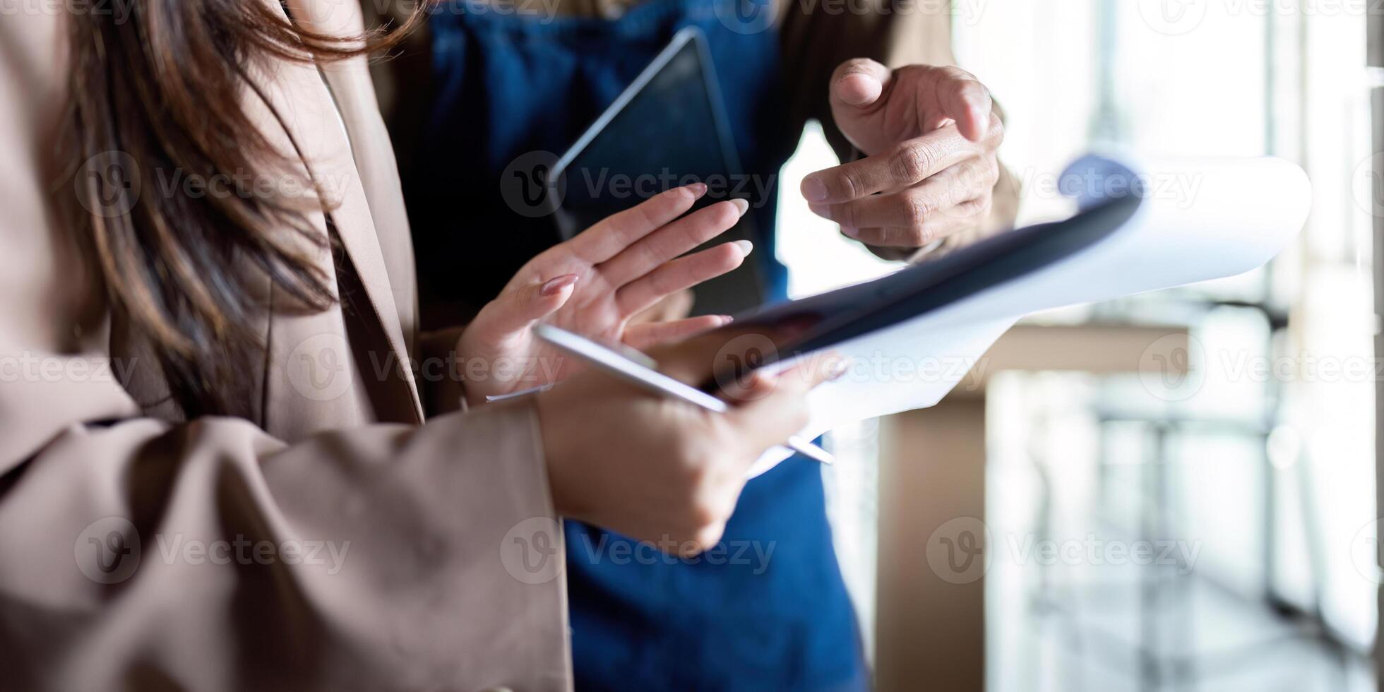 Entrepreneur presenting ideas with notes and tablet photo