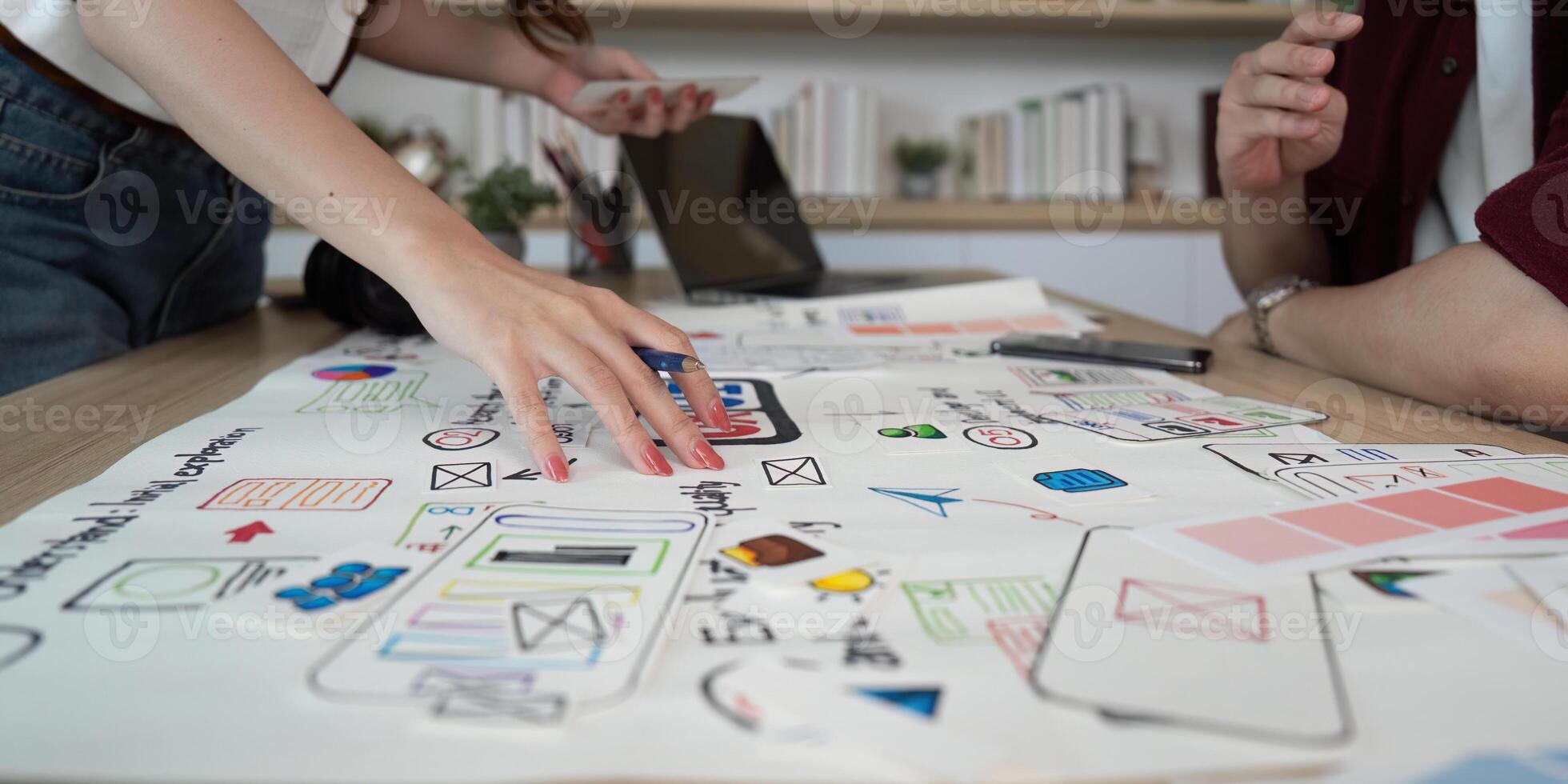 Hands-on UX UI Design Workshop. Participants engaging with design elements. photo
