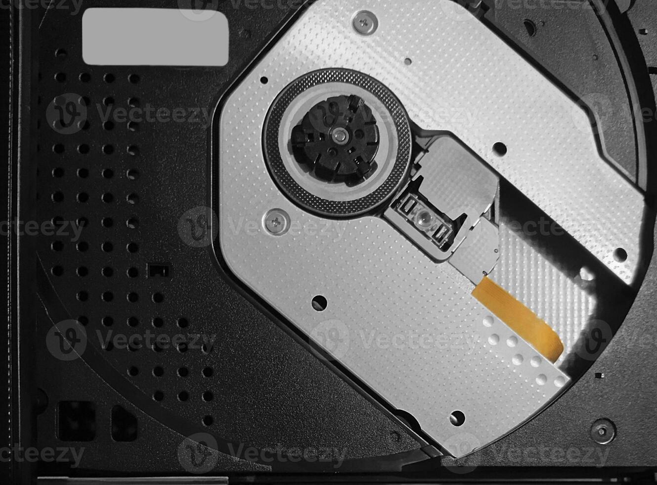 Close-up of laptop disk drive with internal components photo