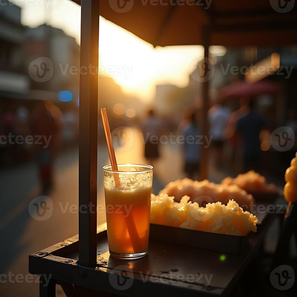 Orange Juice on Street Food Cart at Sunset Refreshment photo