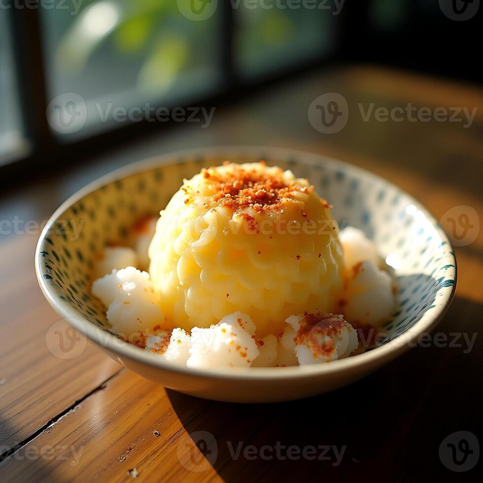 Serving of Pudding Dessert with Topping in Bowl photo