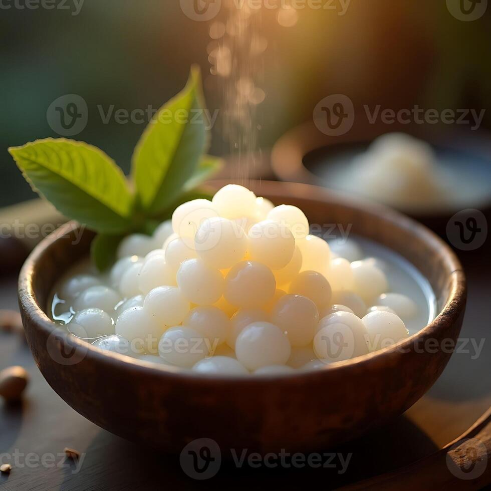Serving Tapioca Pearls in a Wooden Bowl with Green Leaf photo