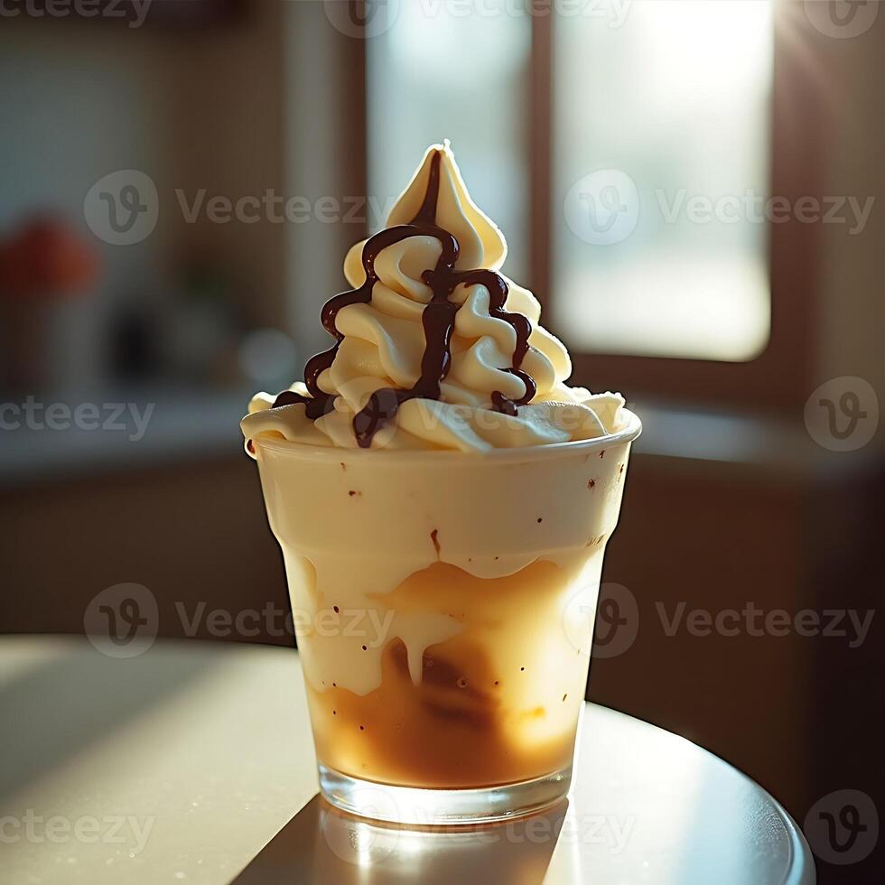 Frozen Dessert with Chocolate Syrup in Glass Cup Close-up photo