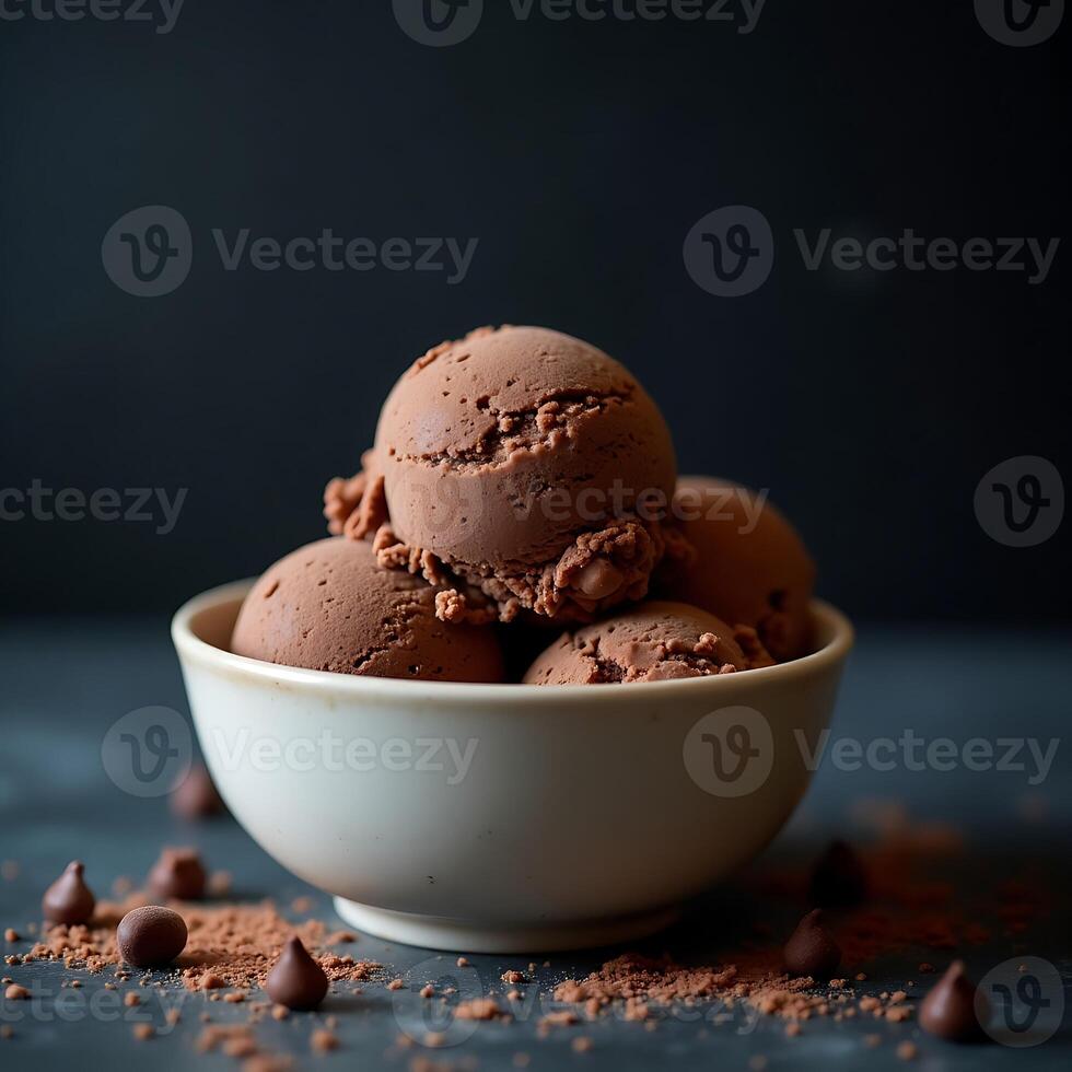 Scoops of Chocolate Dessert in Bowl with Cocoa Powder photo
