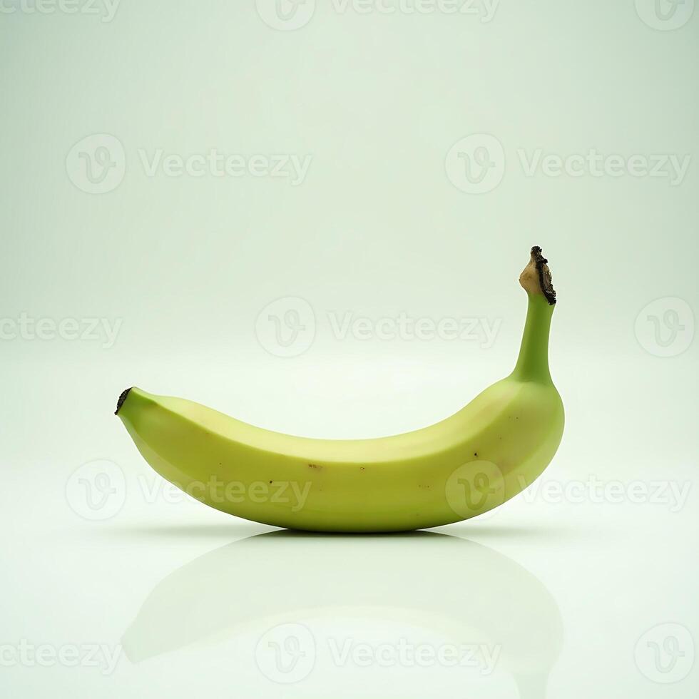 Banana Fruit on White Surface Showing Reflection photo