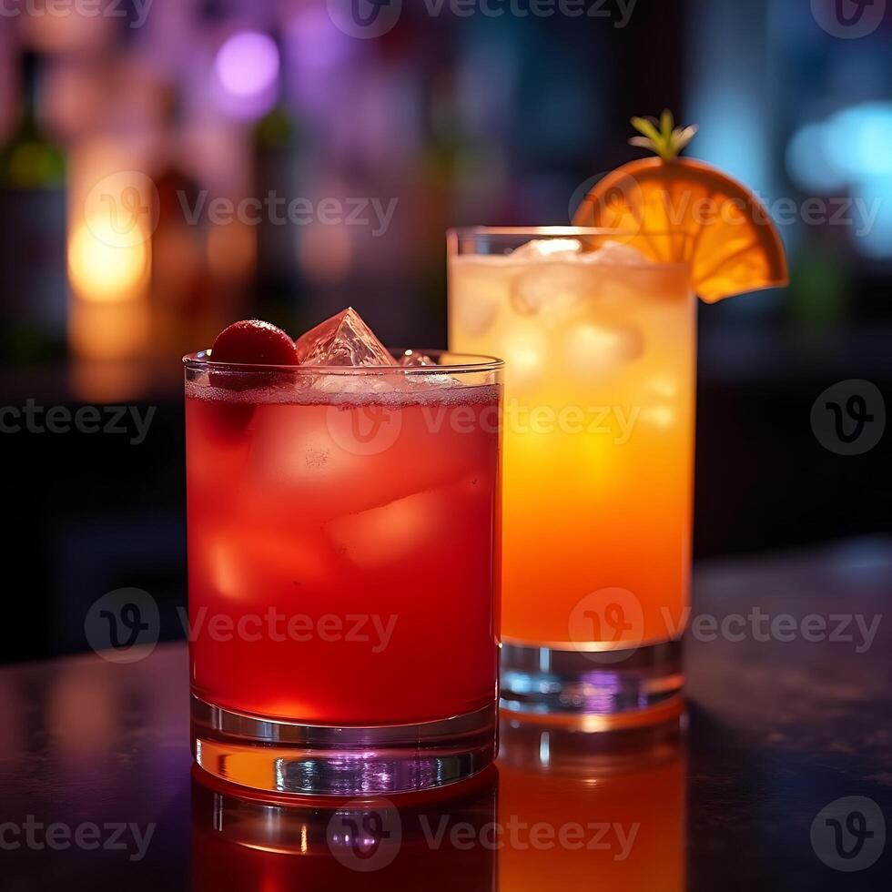 Two Refreshing Cocktails with Ice on a Bar Top photo