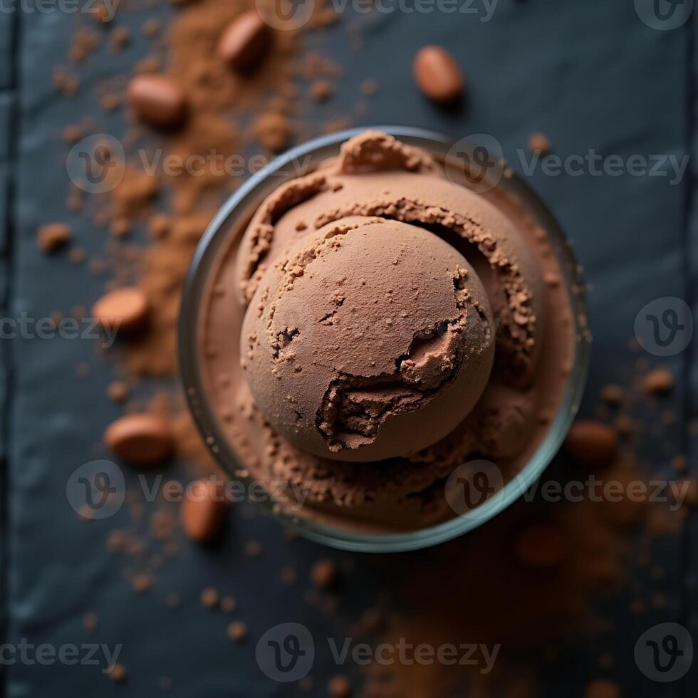 Chocolate Ice Cream Scoops in Glass with Cocoa Powder and Almonds photo