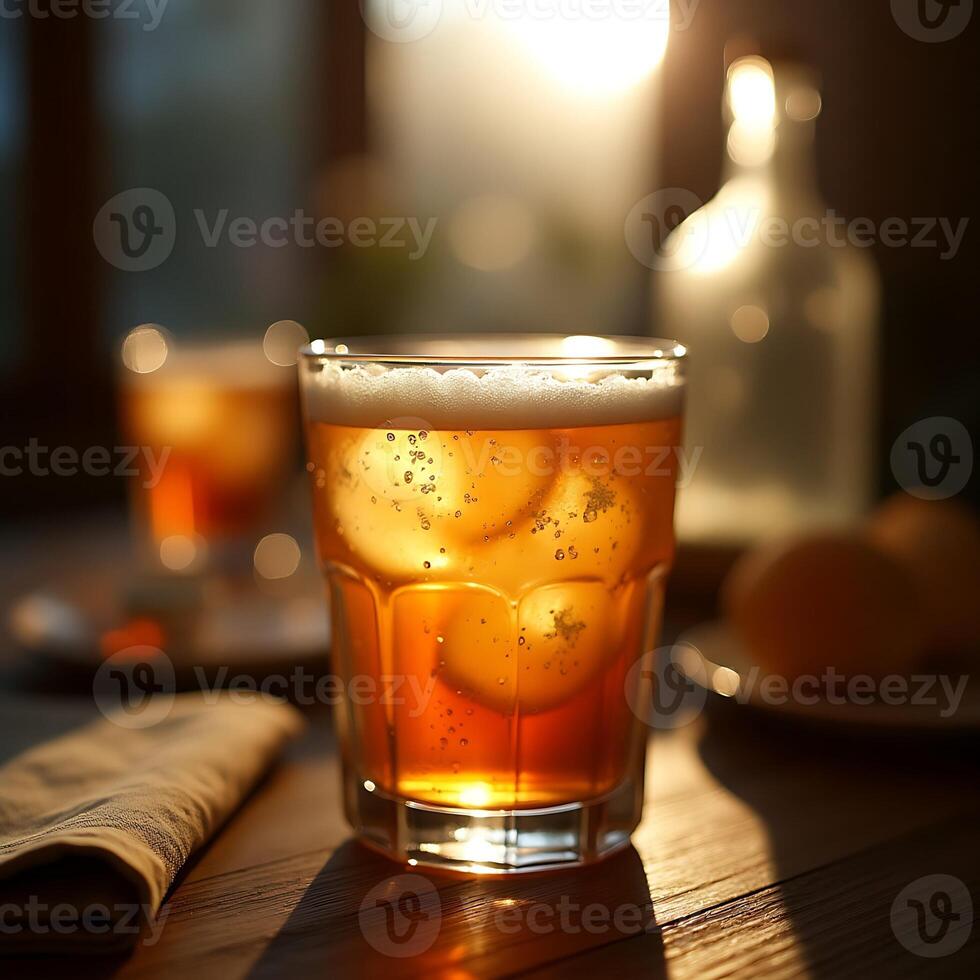 Refreshing Drink with Lemon Slices on Wooden Table in Sunlight photo