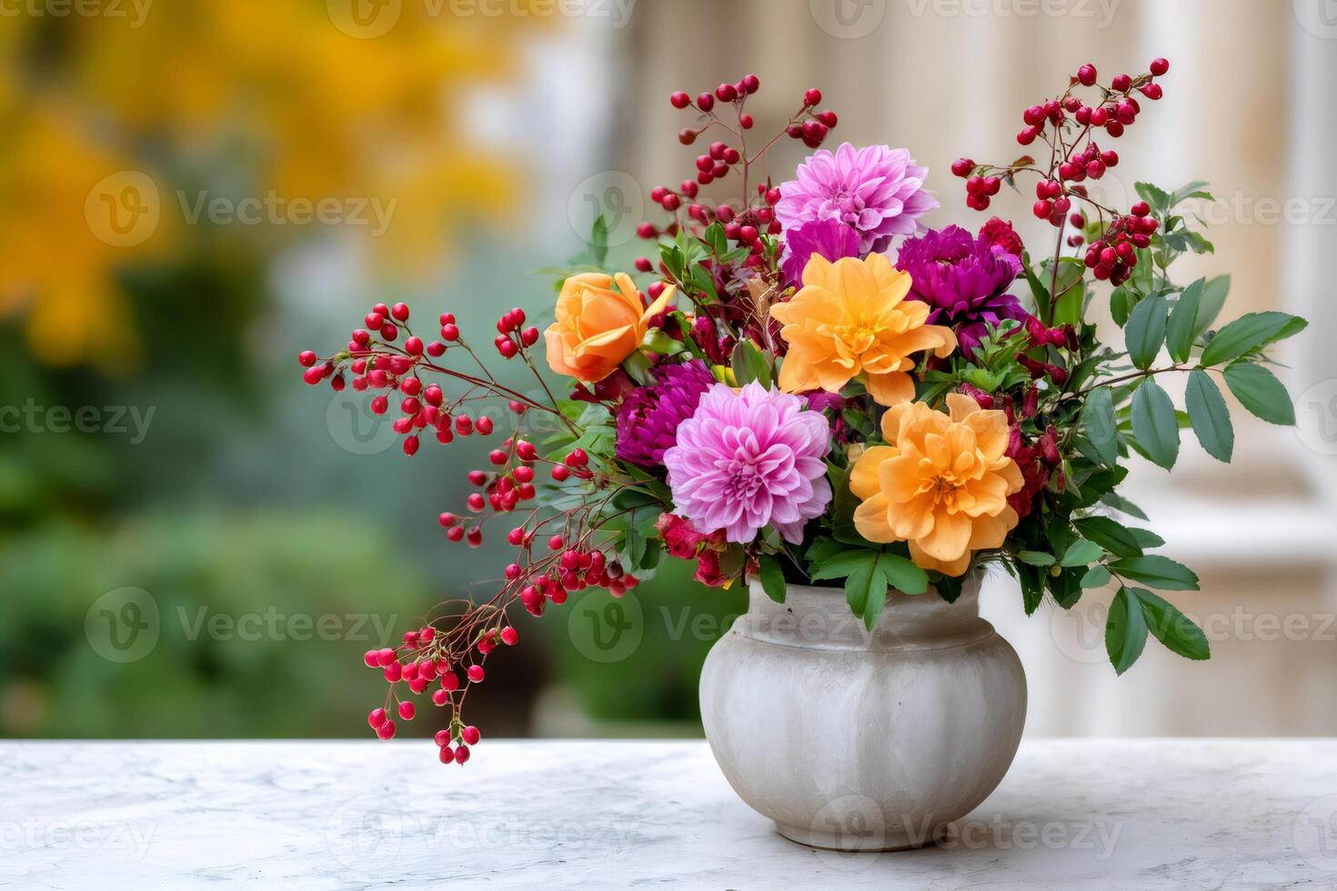 Vibrant bouquet of dahlias and roses resting on a marble surface photo