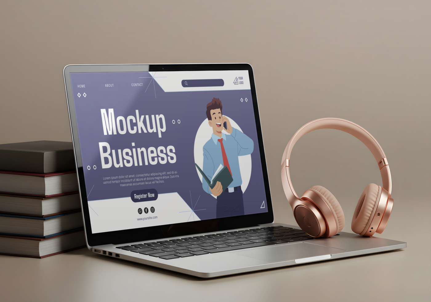 A laptop displaying a business mockup sits next to a stack of books and rose gold headphones psd