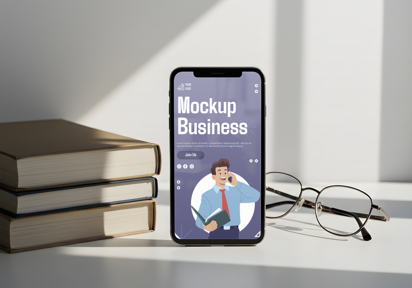A smartphone displaying a business mockup sits on a desk next to books and glasses psd