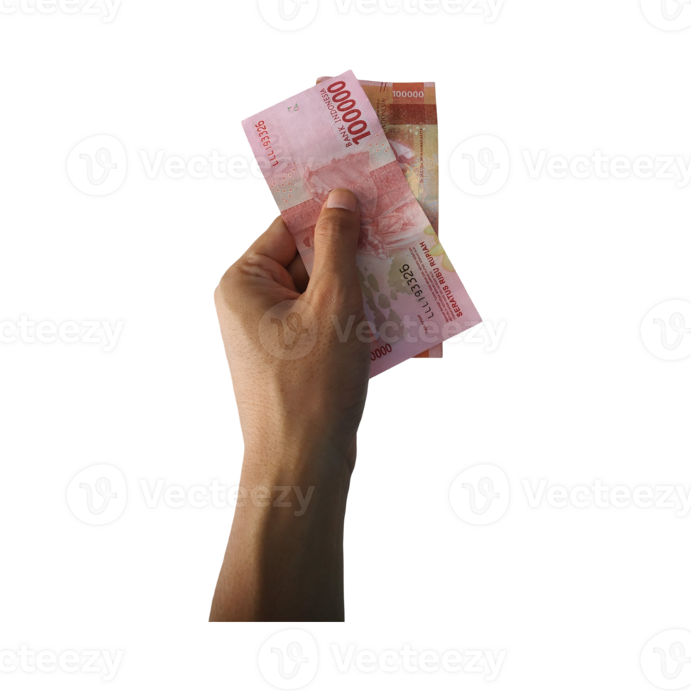 A hand holding Indonesian 100,000 rupiah banknotes isolated on transparent background, representing payment, finance, or economic activity. png