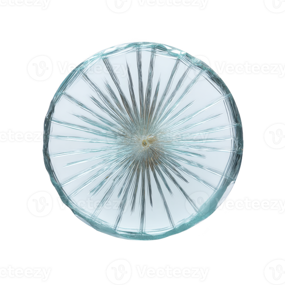 Round, clear glass object with starburst pattern radiating from center, creating textured and intricate design. glass has light blue tint, adding subtle color to otherwise transparent material png