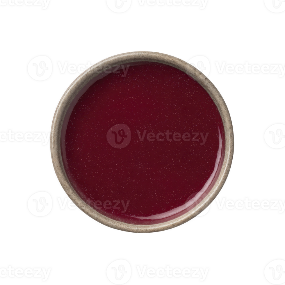 Round ceramic bowl filled with vibrant red liquid, possibly sauce or soup, viewed from above. smooth surface and rich color create striking visual contrast with neutral toned bowl png
