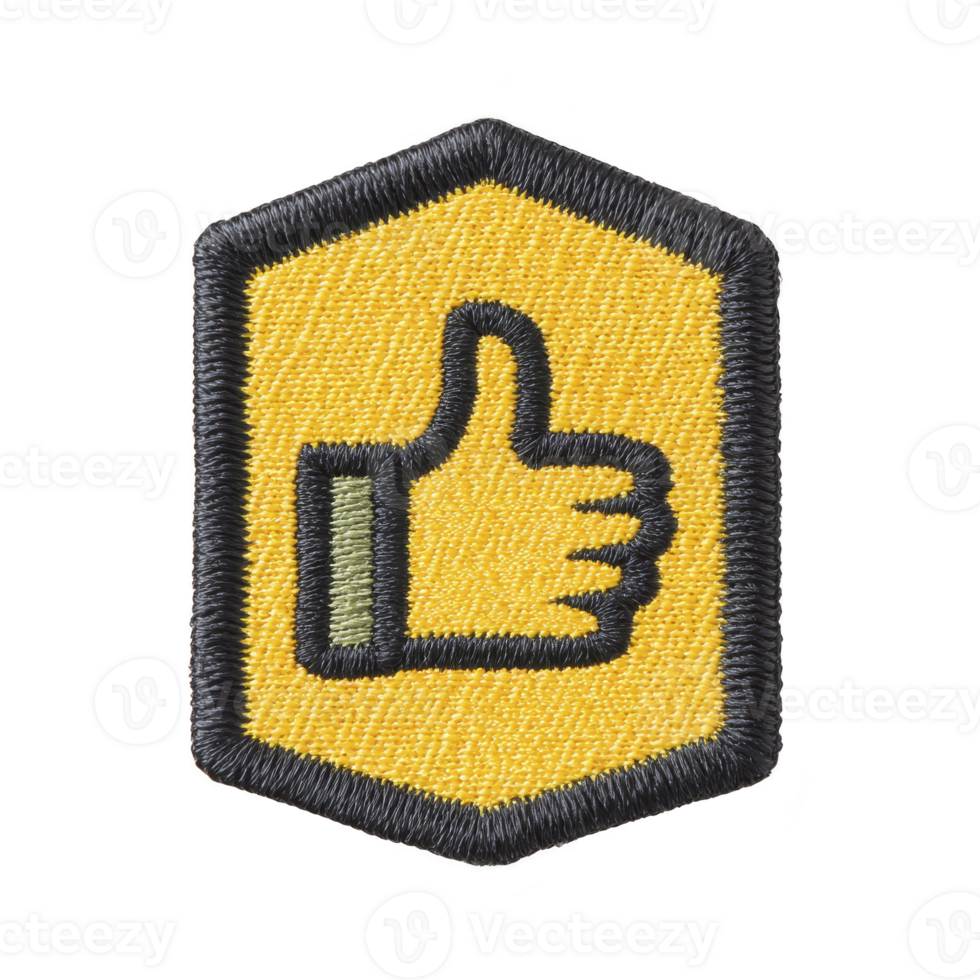 Yellow embroidered patch features black outline of thumbs up symbol, set within hexagonal shape. patch has black border, giving it bold and striking appearance png
