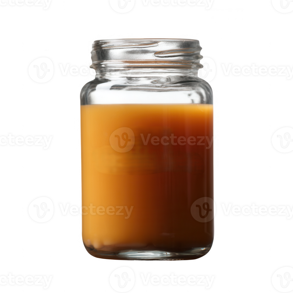 A clear glass jar filled with creamy caramel sauce, placed against a white isolated background, ideal for food photography and recipe features. png