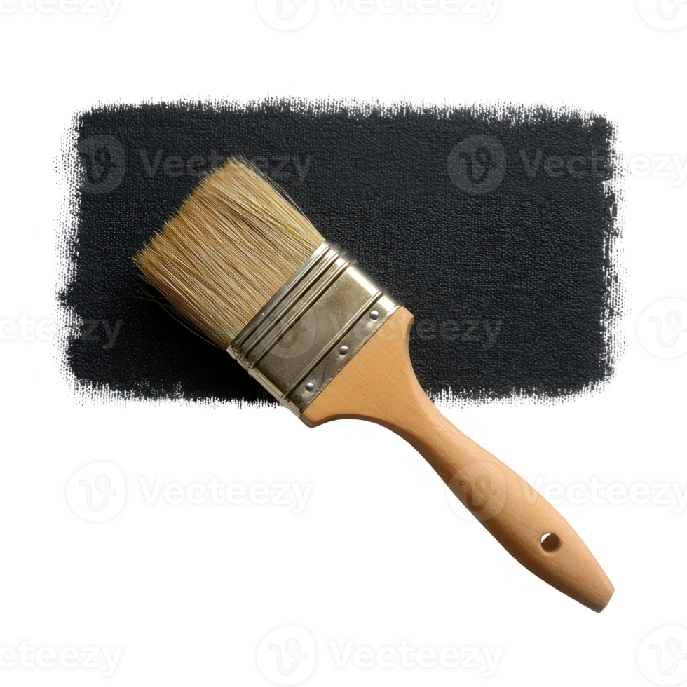 A paintbrush resting on a surface of black paint, displaying its bristles and wooden handle, perfect for artistic and creative projects. png