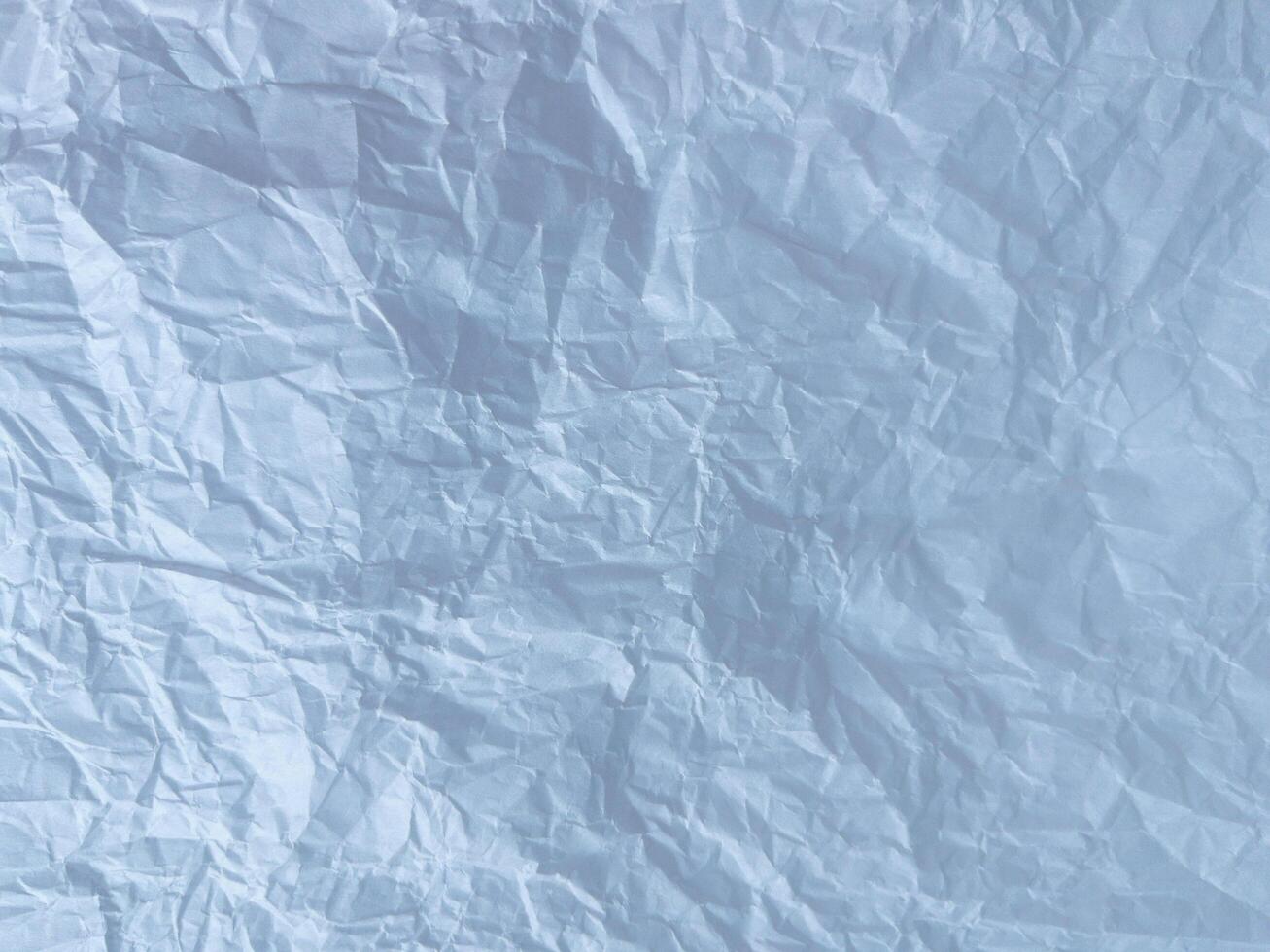 White recycled craft paper texture as background. Grey paper texture, Old vintage page or grunge vignette of old newspaper photo