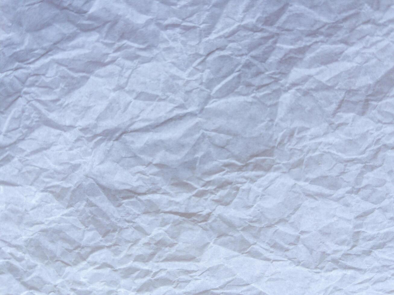 White recycled craft paper texture as background Grey paper texture. Old vintage page or grunge vignette of old newspaper. photo